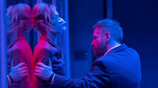 Elizabeth Debicki and Kenneth Branagh in the spy thriller Tenet.