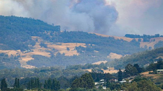 Smoke billows from a wildfire south of Huonville in southern Tasmania on Tuesday.
