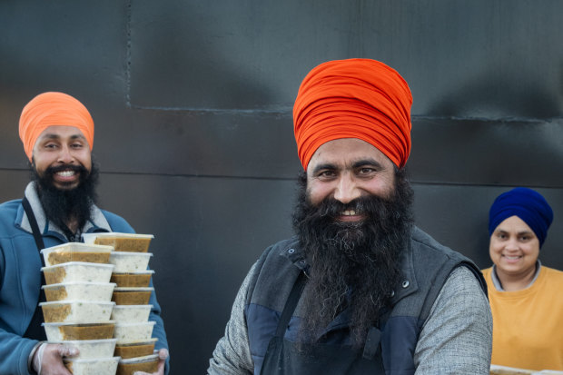 Sikh volunteers Manpreet Singh, Gurkirapal Singh and Sukhwinder Kaur.
