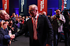 Prime Minister Anthony Albanese shakes hands as he makes his way through the crowd at the Labor Party National Conference.