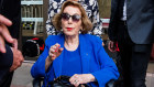 Ita Buttrose leaves the Federal Court building in Sydney.