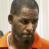 R. Kelly leaves a hearing in Chicago.