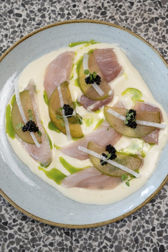Kingfish crudo, buttermilk dressing, caviar and herb oil.
