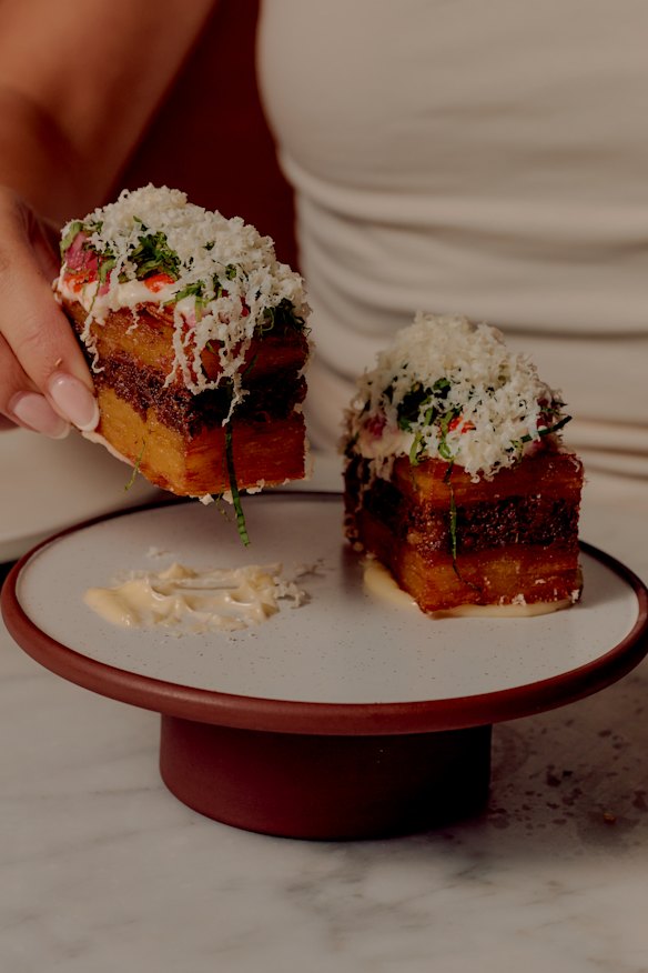 HSP bites: crisp potato with slow-cooked lamb, chilli and garlic sauces.