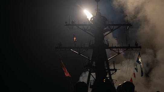 The guided-missile destroyer USS Gravely launches Tomahawk missiles in response to Houthi attacks.