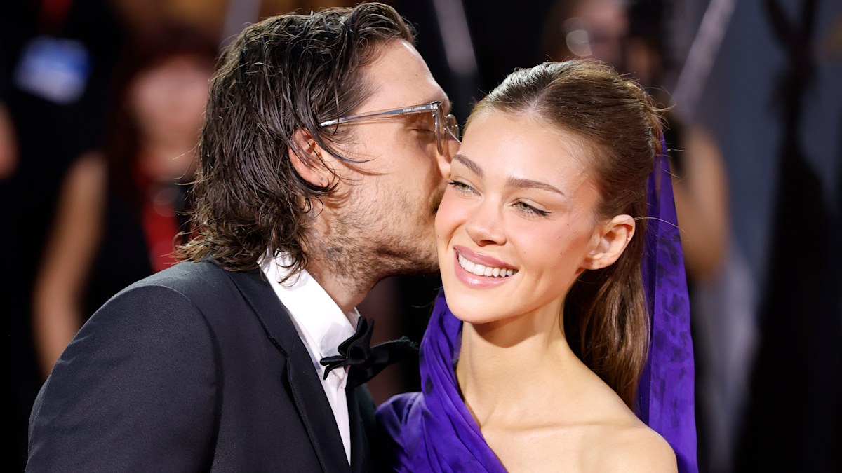 Brooklyn Beckham packs on PDA with wife Nicola on Venice red carpet - as she’s handed prestigious award