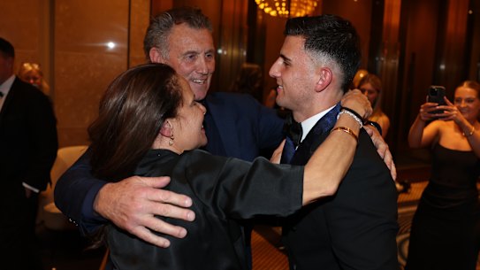 Nick Daicos (right) with his parents Peter and Colleen.