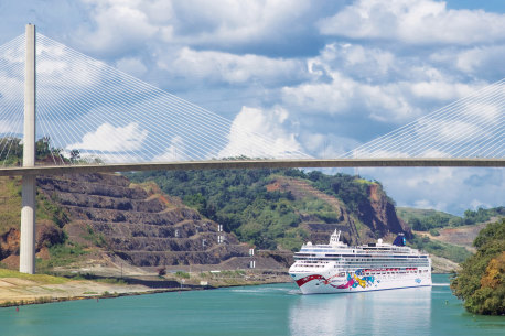 Norwegian Jewel passes beneath Centennial Bridge on the Panama Canal.