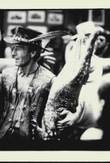 Paul Hogan and friend in Crocodile Dundee.
