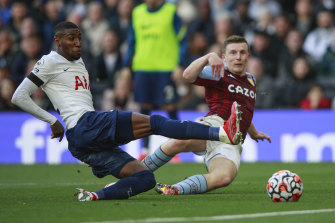 Spursâ Emerson Royal tackles Aston Villaâs Matt Targett at the Tottenham Hotspur Stadium on Sunday.