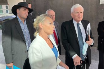 Former Logan councillors Phil Pidgeon, Trevina Schwarz and Russell Lutton, with Ms Schwarz’s lawyer Terry O’Gorman outside Brisbane Magistrates Court after their fraud charges were dropped.