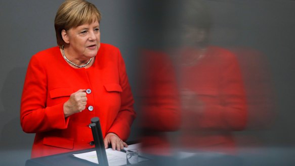 German Chancellor Angela Merkel delivers her speech during a plenary session of the Bundestag on Wednesday.
