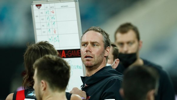 Ben Rutten speaks to his players.