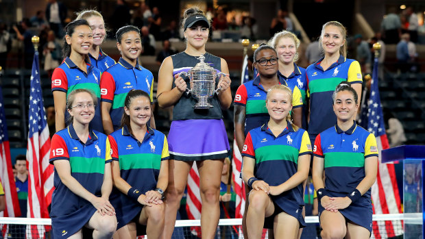 The spoils: Andreescu, of Canada, poses with the championship trophy.