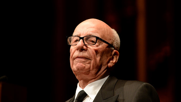 Rupert Murdoch is giving up his bonus after News Corporation reported a quarterly loss.