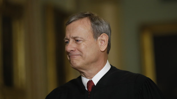 Chief Justice of the United States, John Roberts walks to the Senate chamber.