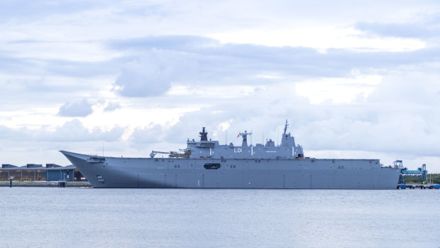 HMAS Adelaide in Brisbane before travelling to Tonga to assist in relief efforts. 