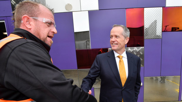 Jobs: Bill Shorten with a worker at Direct Edge Manufacturing in Burnie.