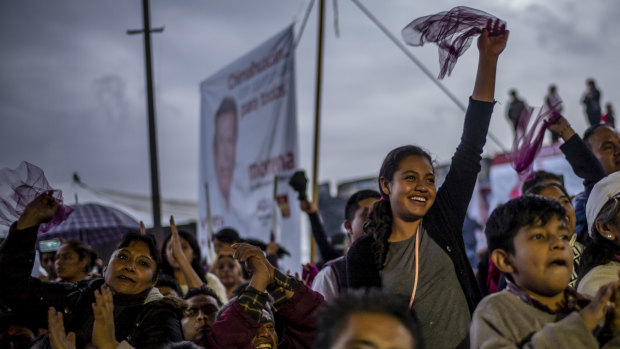 A young supporter of presidential candidate Andrés Manuel López Obrador during a campaign rally.