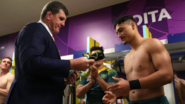 Huge promise: Tim Gavin presents the talented Jordan Petaia with his first Wallabies cap after the Uruguay match.