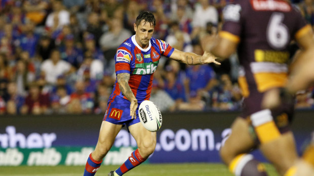 Point made: Mitchell Pearce keeps the score ticking over with a field goal.