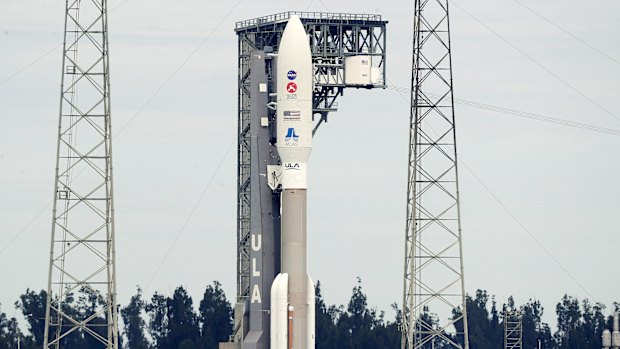 A United Launch Alliance Atlas V rocket that will launch to Mars arrives at Space Launch Complex 41 at the Cape Canaveral Air Force Station.