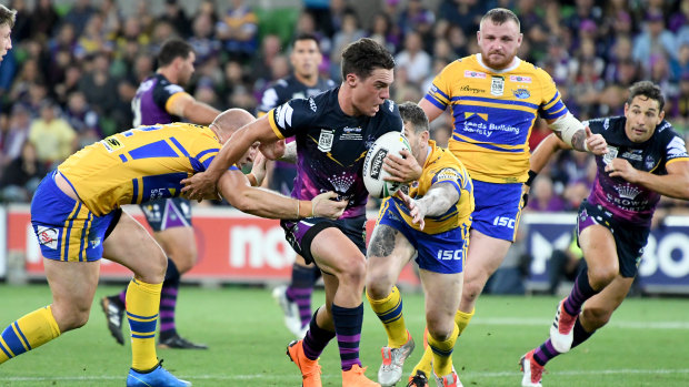 Familiar combination: Billy Slater runs a support line for Brodie Croft.