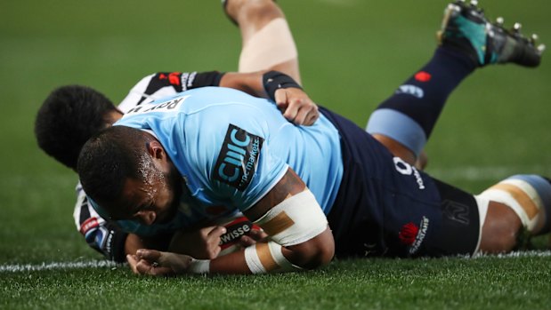 Prolific: Sekope Kepu scores one of 12 tries for the Waratahs at Allianz Stadium.