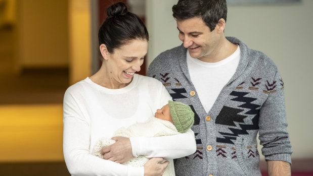 New Zealand Prime Minister Jacinda Ardern and her partner Clarke Gayford leave hospital with their new baby daughter in Auckland.