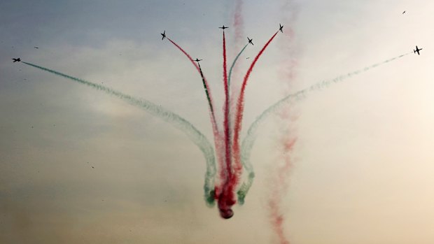 Pakistani  fighter jets perform an aerobatic stunt during an air show this year.