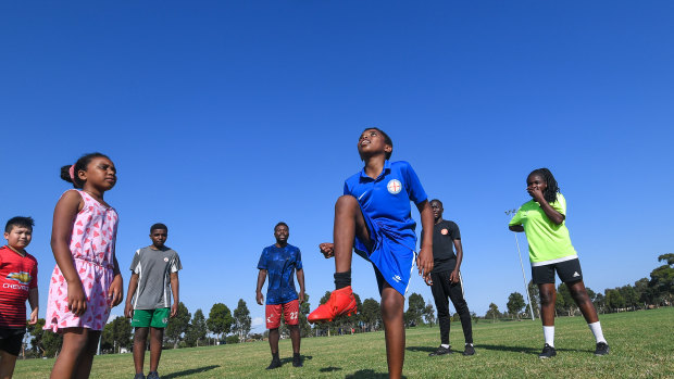 Eangano Singehebhuye teaches  children whose parents can't afford sporting club fees how to play soccer for free.   