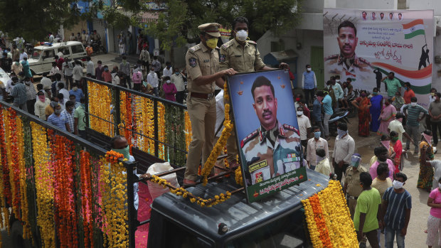 Mourners take part in a funeral procession for Colonel Santosh Babu, the most senior Indian officer killed in the clashes, in his home town of Suryapet, about 140 kilometres from Hyderabad, on Thursday.