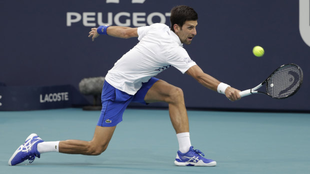 Novak Djokovic reaches for a return against Federico Delbonis at the Miami Open. 