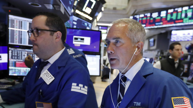 Wall Street jumped before paring some of its gains late in the session. 