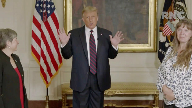 President Donald Trump speaks with frontline workers in a pre-recorded video broadcast during the first day of the virtual Republican convention.