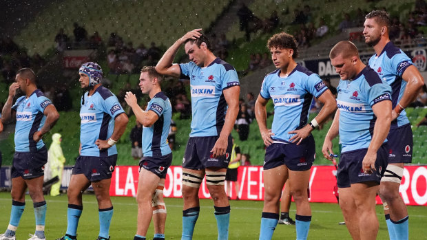 Rob Simmons and Waratahs players look on during their round three loss to the Melbourne Rebels. 