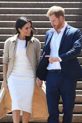 Prince Harry and Meghan on the steps of the Sydney Opera House.