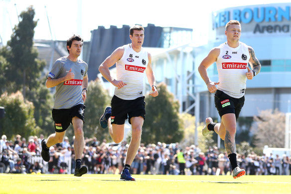 Jordan De Goey (right) was moving well at a festive Collingwood training session on Thursday.