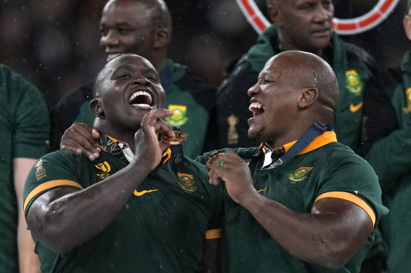 South Africa’s Trevor Nyakane, left, and Mbongeni Mbonambi celebrate the World Cup win.