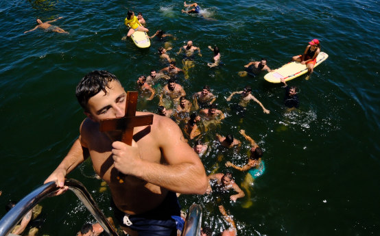 Blessed: Steve Kikyris on Princes Pier after being first to the cross in the Blessing of the Waters swim.