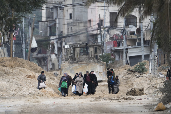 Residents of the West Bank refugee camp of Nur Shams, Tulkarem, evacuate their homes this week.