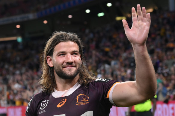 Pat Carrigan celebrates with fans after the Broncos’ victory against Melbourne Storm.