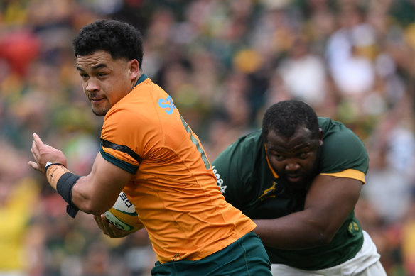 Hunter Paisami takes on the defence