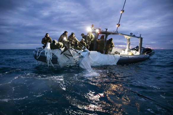 Sailors recovering the Chinese high-altitude surveillance balloon off the coast of Myrtle Beach, South Carolina. 