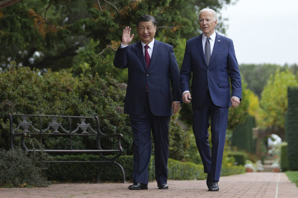 China’s President Xi Jinping and US President Joe Biden walk in the gardens at the Filoli Estate in California.