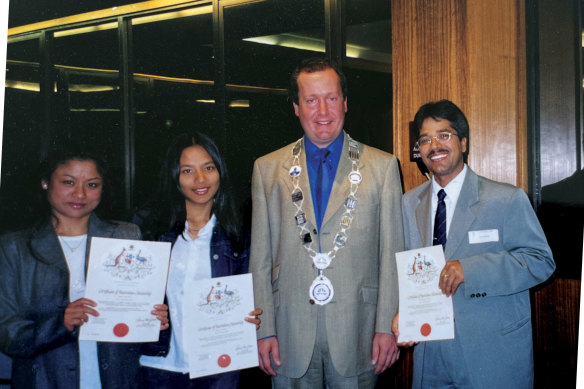 The family (with councillor Sam Byrne) in 2004 in multicultural Marrickville receiving their citizenship.