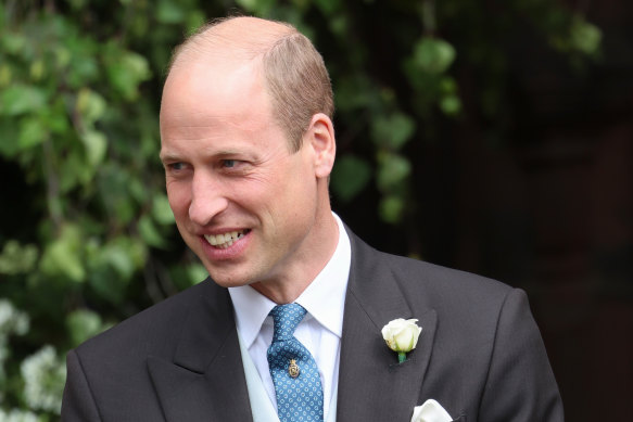 Prince William smiles after the wedding ceremony of Hugh Grosvenor and Olivia Grosvenor.