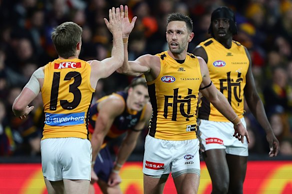Jack Gunston of the Hawks celebrates a goal.