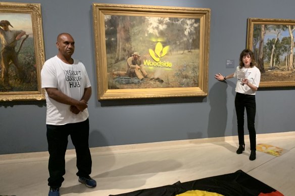 Ballardong Noongar man Desmond Blurton and ceramic artist Joana Partyka at the Art Gallery of WA last year. Don’t worry, the painting was protected by Perspex.
