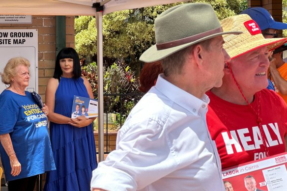 Cairns LNP candidate Yolande Entsch (left), the wife of local federal MP Warren Entsch, watched on as the Labor campaign rolled through the city.
